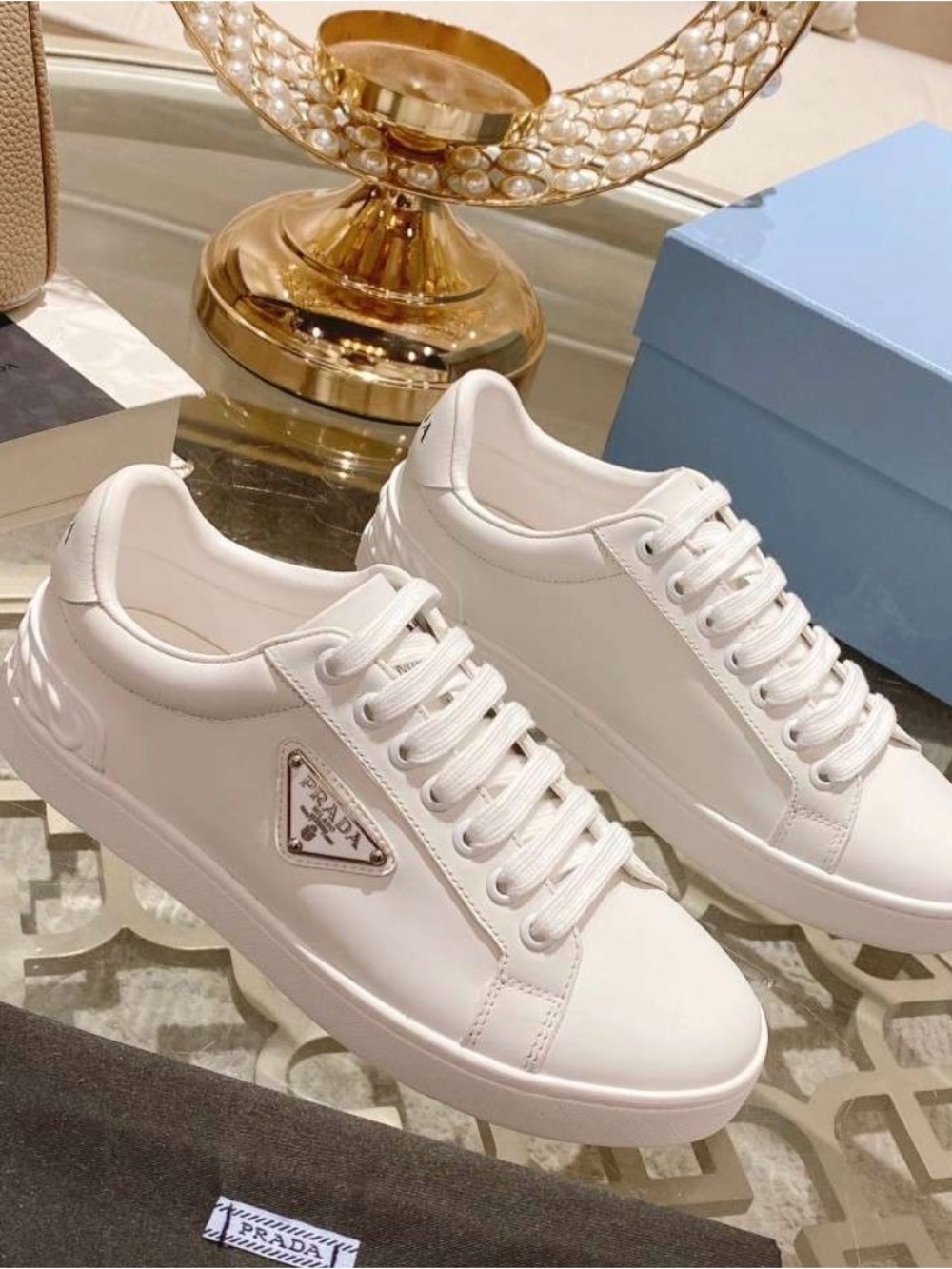 Prada White Leather Low-Top Sneakers with Logo Plaque